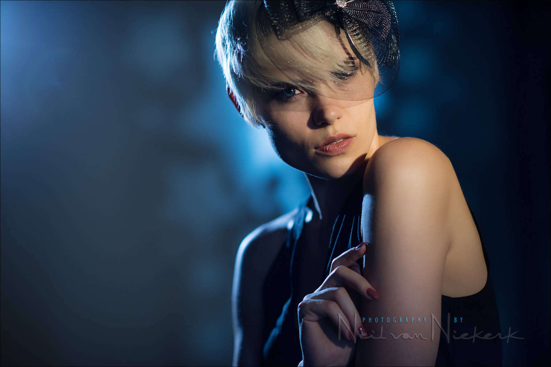 Dramatic studio portrait with directional lighting